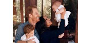 Prince Harry and Meghan in a rare photo with son Archie and daughter Lilibet.