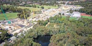 A tunnel entrance for Victoria’s $26 billion North East Link is under construction near the billabong.