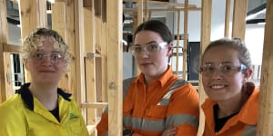 Former chef Bridget Bottcher connected with a new network of women when switching career. Yellow jacket:Lily Kingston,21;Tallest:Bridget Bottcher,28;Blonde in orange jacket:Vanessa Tierney,28. 