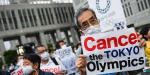 A protest against the Olympics in Tokyo,where the government is trying to live with COVID-19.