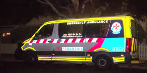 An ambulance at a Northcote house woman is believed to have died with COVID-19 in August.