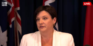 NSW MP Jodi McKay holds back tears after she resigned as NSW Labor leader.