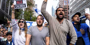 Supporters of Israel gather near the Israeli Consulate in New York,Monday,Oct. 9.