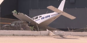 Pilot escapes injury after plane crashes into fence,car at Bankstown