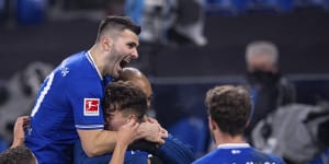 Schalke team members celebrate a goal by Matthew Hoppe against Hoffenheim.