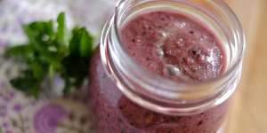 Power-packed breakfast in a jar:Blueberry and mint smoothie with celery.