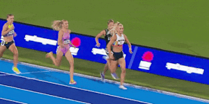 Jess Hull is felled in the final straight of the 1500m final.