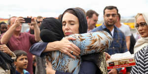 Jacinda Ardern hugs a woman at a mosque in Wellington,two days after the Christchurch mosque shootings.