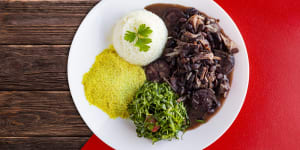 Brazilian Feijoada Food. Top view - Imagem sunnov24cover LOCAL FLAVOURS (Ben Groundwater) iStock TRAVELLER reuse permitted for print and online 