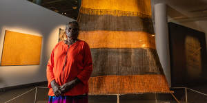 NATSIAA winner and senior Yolngu artist Margaret Rarru Garrawurra with her winning art work Dhomala (pandanas sail).