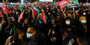 Democratic Progressive Party supporters attend a political rally in Taipei on Thursday. 