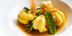 King prawns with snowpeas,zucchini and saffron and pomegranate sauce.