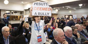 Supporters of Deeming yell “shame” at John Pesutto during the Liberal Party’s state conference in Bendigo in May.