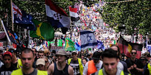 Crowds attending a Eureka freedom rally,Melbourne,on Saturday.