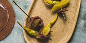 The namesake skewers with green olive,anchovy,piparra and preserved lemon.