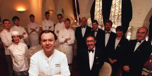 Philippe Mouchel surrounded by staff as they prepare for Bocuse restaurant's closure.