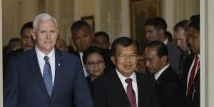 Former Indonesia vice president Jusuf Kalla (right) with his then US counterpart Mike Pence in Jakarta in 2017.