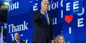 Biden blows a kiss as his grandson,Beau Biden,makes the peace sign at the Democratic National Convention.