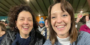 Member for Kooyong Monique Ryan and her chief of staff Sally Rugg in happier times at an AWFL match.
