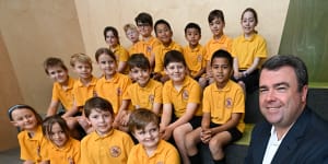 Ruskin Park Primary School principal Andrew Moore,pictured with grade 3 students,says the school’s focus on attitude and effort,rather than getting the right answer,has helped its NAPLAN results. 