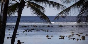 A child plays near the beach in Nauru.