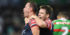 Luke Keary and Boyd Cordner celebrate after they combined for a try against the Rabbitohs.