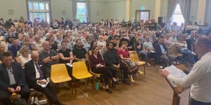 Inner West Mayor Darcy Byrne speaks to frustrated residents at a meeting about the Rozelle interchange on Thursday night.