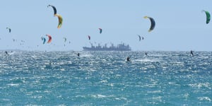 Record smashed as kiteboarders ride the wind across Gage Roads