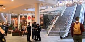 ‘A lot of blood’:Man charged over stabbing at Brisbane train station