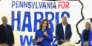 Vice President Kamala Harris speaks,watched by running mate Tim Walz (second from right) at a campaign event in Pennsylvania in August.