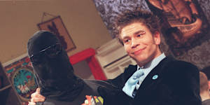 Dylan Lewis on the set of Recovery in 1997 with the Enforcer,played by Angus Sampson.