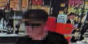 A man seen walking out of a Melbourne IGA allegedly carrying a bag of stolen meat. 