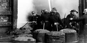 Fighting the fire at number 7 wharf,Cambell's Cove,near Circular Quay. 2nd August 1944