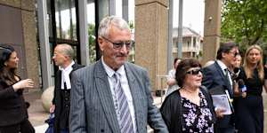 Bill Spedding leaves court on Thursday with his wife.