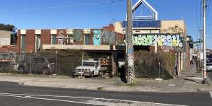 Welcome to Thornbury:Boarded up windows,graffiti and run-down cars