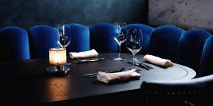 Royal blue is the dominant colour in the dining room,which Chris Lucas says is a nod to Venetian interiors.