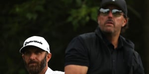 Dustin Johnson and Phil Mickelson on Thursday.