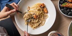 Spaghetti cacio e pepe with mussels.