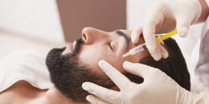 More men than ever are getting anti-ageing treatments,like Botox.