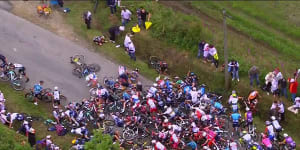 An aerial view of the crash caused by a person with a sign on the first day of the Tour de France.