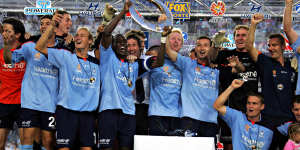 Dwight Yorke leads the celebration for Sydney FC after they won the inaugural A-League title in 2005.