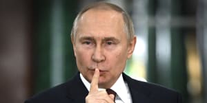 Hear no evil? Russian President Vladimir Putin 