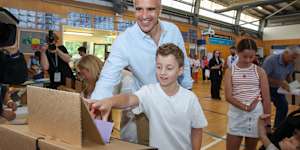SA Premier Peter Malinauskas voting with his family at Woodville Gardens School.