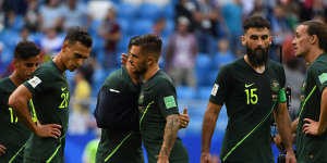 Old firm:Trent Sainsbury and Josh Risdon on the world stage,after the Denmark draw.