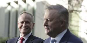 Opposition Leader Anthony Albanese (right) speaks in June with the man he replaced as Labor leader,Bill Shorten.