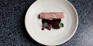 Aged duck with red cabbage marmalade,salt-baked beetroot and raspberry coulis. 