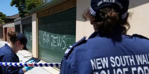 Forensics inspect antisemitic graffiti from multiphy cars and houses at See Lane,Kingsford.