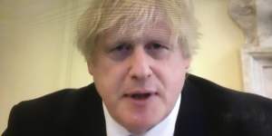 British Prime Minister Boris Johnson speaks to a parliamentary committee by videolink.