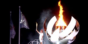 Naomi Osaka lights the Tokyo Olympic Games cauldron.