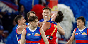 Tom Liberatore remonstrates with the close-checking Jarrod Berry.